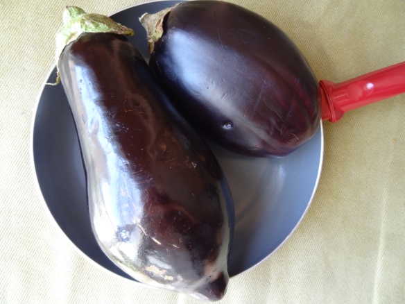 Place eggplants in pan